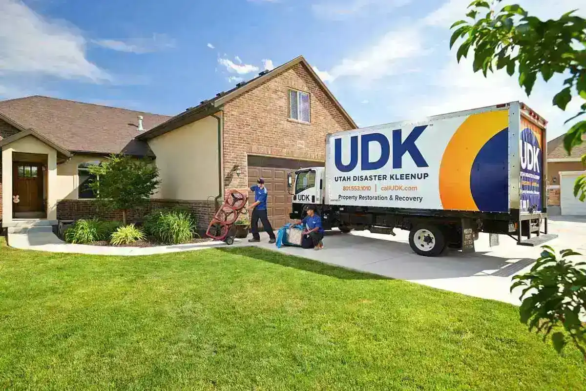 UDK truck out in front of house responding to disaster recovery situations
